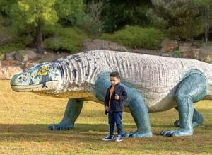 Child in the Gardens with Megalania MEGAfauna reproduction