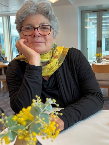 Suzette Searle enjoying a wattle-themed High Tea at Parliament House in 2022