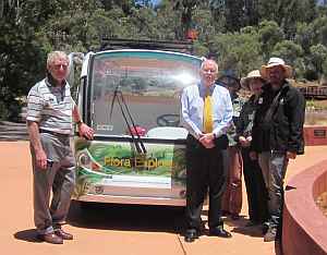 Mr Michael Bryce with Flora Explorer at the Red Centre Garden    Photo: Jill Mo 