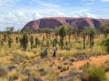 Jay Nicholson conducting fieldwork at Uluru