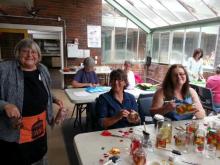 Friends making lanterns